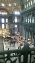 Beautiful Hagia Sophia Mosque inside. A look to Altar and of many tourists