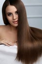 Beautiful Hair Color. Woman With Glossy Straight Brown Long Hair Royalty Free Stock Photo