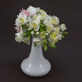 Hand made polymer clay flower bouquet in a white vase on a dark