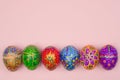 Beautiful hand-painted Easter eggs on a pink background Royalty Free Stock Photo