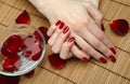 Beautiful hand with perfect nail red manicure Royalty Free Stock Photo