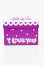 Beautiful hand-purple gift box in white background