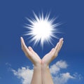 Beautiful hand sun and blue sky Royalty Free Stock Photo