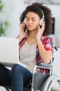 Beautiful handicaped woman listening to music and relaxing Royalty Free Stock Photo