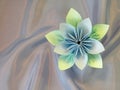 Handmade blue origami flower