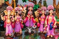 Beautiful handmade statuette of a Goddess Durga idol is displayed in a shop for sale in blurred background. Indian art and