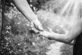 Beautiful hands of parent and child on sea background Royalty Free Stock Photo