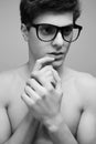 Beautiful (handsome) muscular male model in trendy eyewear Royalty Free Stock Photo