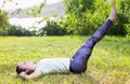 Young woman exercising outdoors in nature Royalty Free Stock Photo