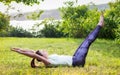 Young woman exercising outdoors in nature Royalty Free Stock Photo