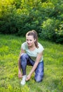 Young woman exercising outdoors in nature Royalty Free Stock Photo