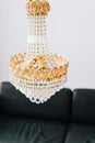 Beautiful hanging chandelier in the living room close-up Royalty Free Stock Photo