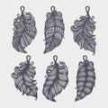 Set of pendants in the shape of leaf, feather.