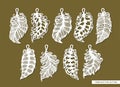 Set of pendants in the shape of leaf, feather. Royalty Free Stock Photo