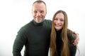 Beautiful happiness fashion couple pretty smiling redhead woman and stylish hipster handsome man sits and hug on a white