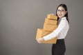 Beautiful happiness woman with box portrait in studio