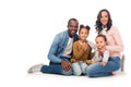 beautiful happy african american family with two kids smiling at camera Royalty Free Stock Photo