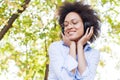 Beautiful Happy Afro American Young Woman Listening Music In Nature Royalty Free Stock Photo