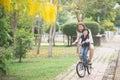 Asian mother and son riding bicycle Royalty Free Stock Photo