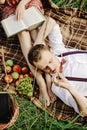 Beautiful happy bride and stylish retro groom, reading books and Royalty Free Stock Photo