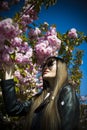 Beautiful happy brunette woman in the park on a warm summer day. Royalty Free Stock Photo