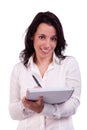 Beautiful and happy businesswoman taking notes Royalty Free Stock Photo