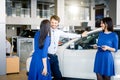 Beautiful happy couple standing near their new car Royalty Free Stock Photo