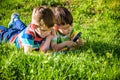 Beautiful happy children, boy brothers, exploring nature with ma Royalty Free Stock Photo
