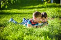Beautiful happy children, boy brothers, exploring nature with ma Royalty Free Stock Photo