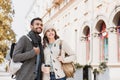 Beautiful happy couple autumn portrait. Young joyful smiling woman and man in a city in winter.  Love, travel, tourism, students c Royalty Free Stock Photo