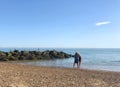 Beautiful happy couple on Clacton-on-sea beach, 8 August 2020, England