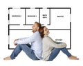 Beautiful happy couple dreaming of buying and design their future first house Royalty Free Stock Photo