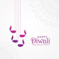 Beautiful happy diwali card design with hanging diya lamps