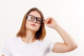 Beautiful happy girl teenager in glasses poses Royalty Free Stock Photo