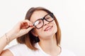 Beautiful happy girl teenager in glasses smiles Royalty Free Stock Photo