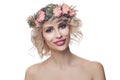 Beautiful happy model woman wearing flowers crown isolated on white background. Curly Hair, Makeup and Flowers Royalty Free Stock Photo