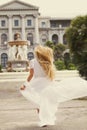 Beautiful happy running bride outdoors Royalty Free Stock Photo