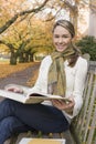 Beautiful, happy, smiling, female woman college university student studying with books on campus Royalty Free Stock Photo