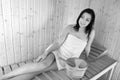 Beautiful happy smiling girl lying in sauna Royalty Free Stock Photo