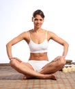 Beautiful happy woman with fit body sitting