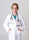 Beautiful and happy woman md doctor or nurse posing smiling cheerful with stethoscope Royalty Free Stock Photo