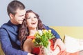 Beautiful happy woman received a flower bouquet of roses Royalty Free Stock Photo