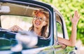 Beautiful happy woman sitting in a car Royalty Free Stock Photo