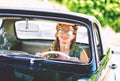 Beautiful happy woman sitting in a car. Royalty Free Stock Photo