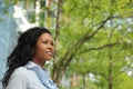 Beautiful happy young black woman outside in the park Royalty Free Stock Photo