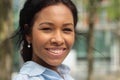 Beautiful happy young black woman outside in the park Royalty Free Stock Photo