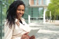 Beautiful happy young black woman outside in the park Royalty Free Stock Photo