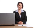 Beautiful happy young business woman in office Royalty Free Stock Photo