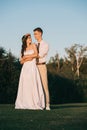 beautiful happy young wedding couple embracing and smiling each other Royalty Free Stock Photo