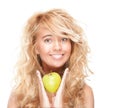 Beautiful and happy young woman with apple. Royalty Free Stock Photo